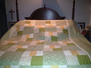 hilbarc quilted green and yellow quilt
